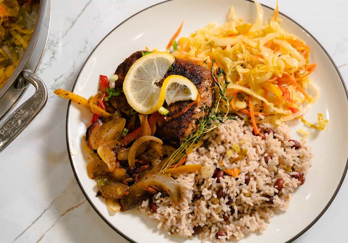 Caribbean fish, rice and peas local food plate