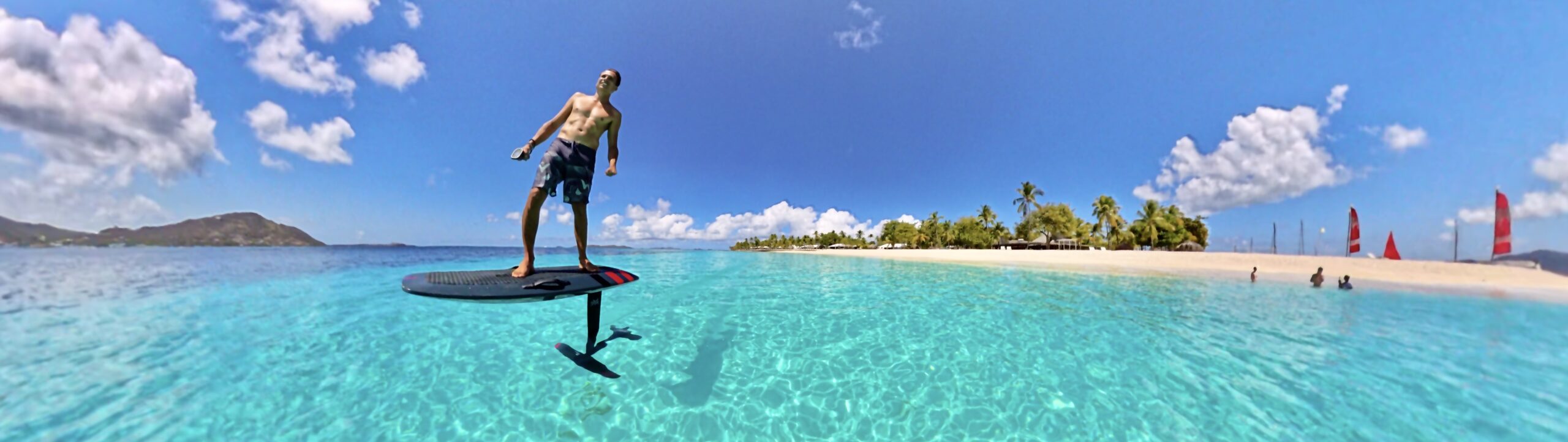 eFoil rider above shallow turquoise water in the Grenadines