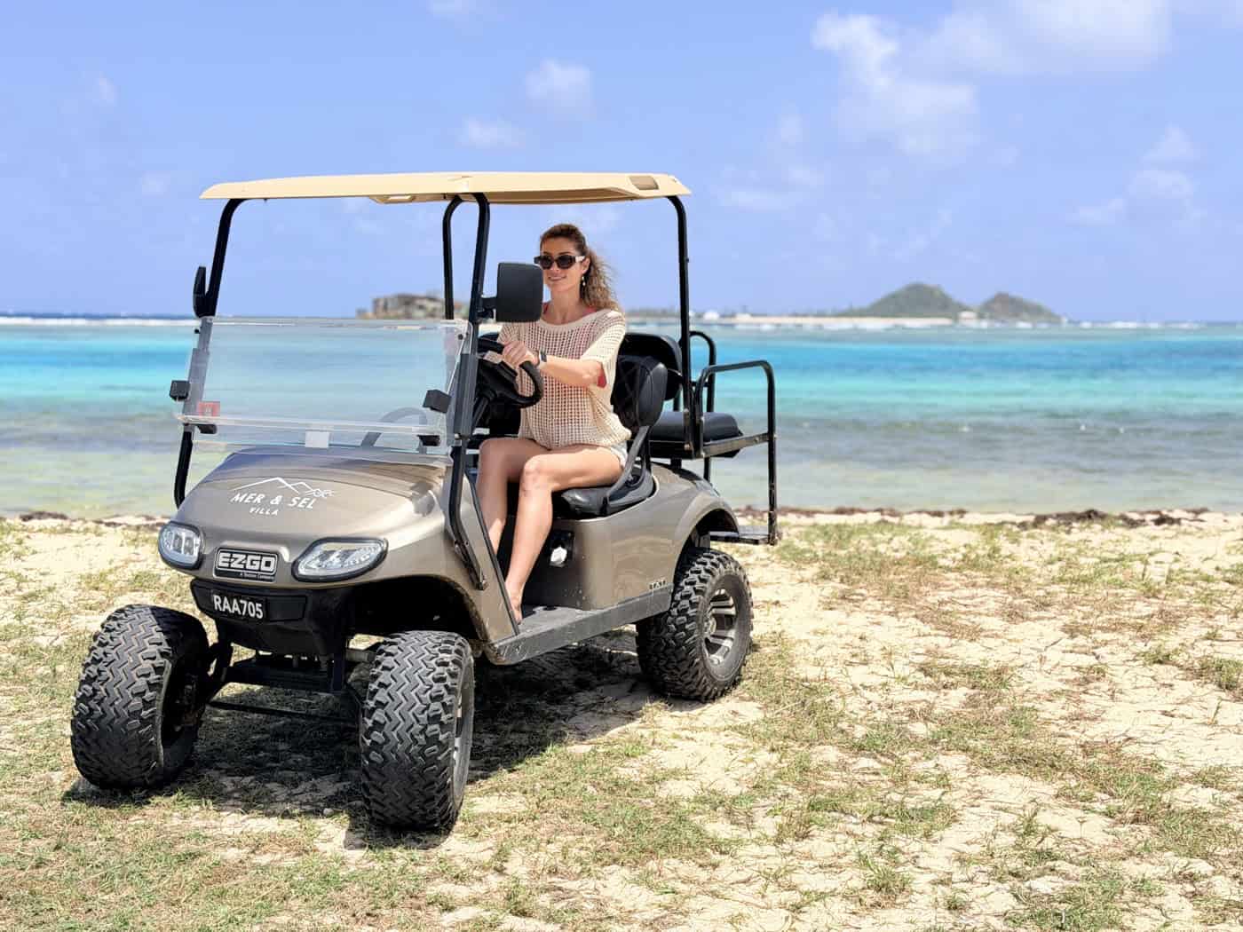 Golf cart on the beach near the villa